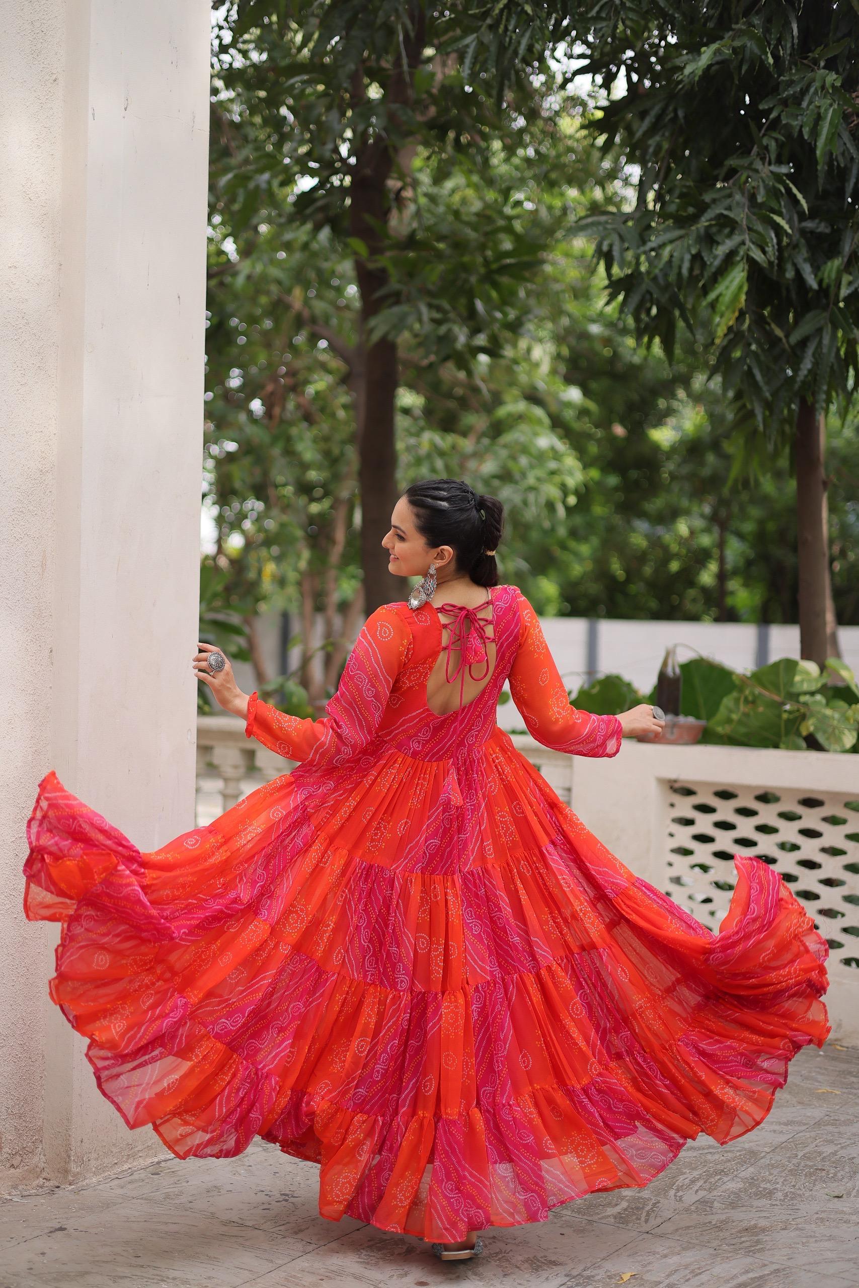 Elegant Orange Laheriya Bandhej Gown