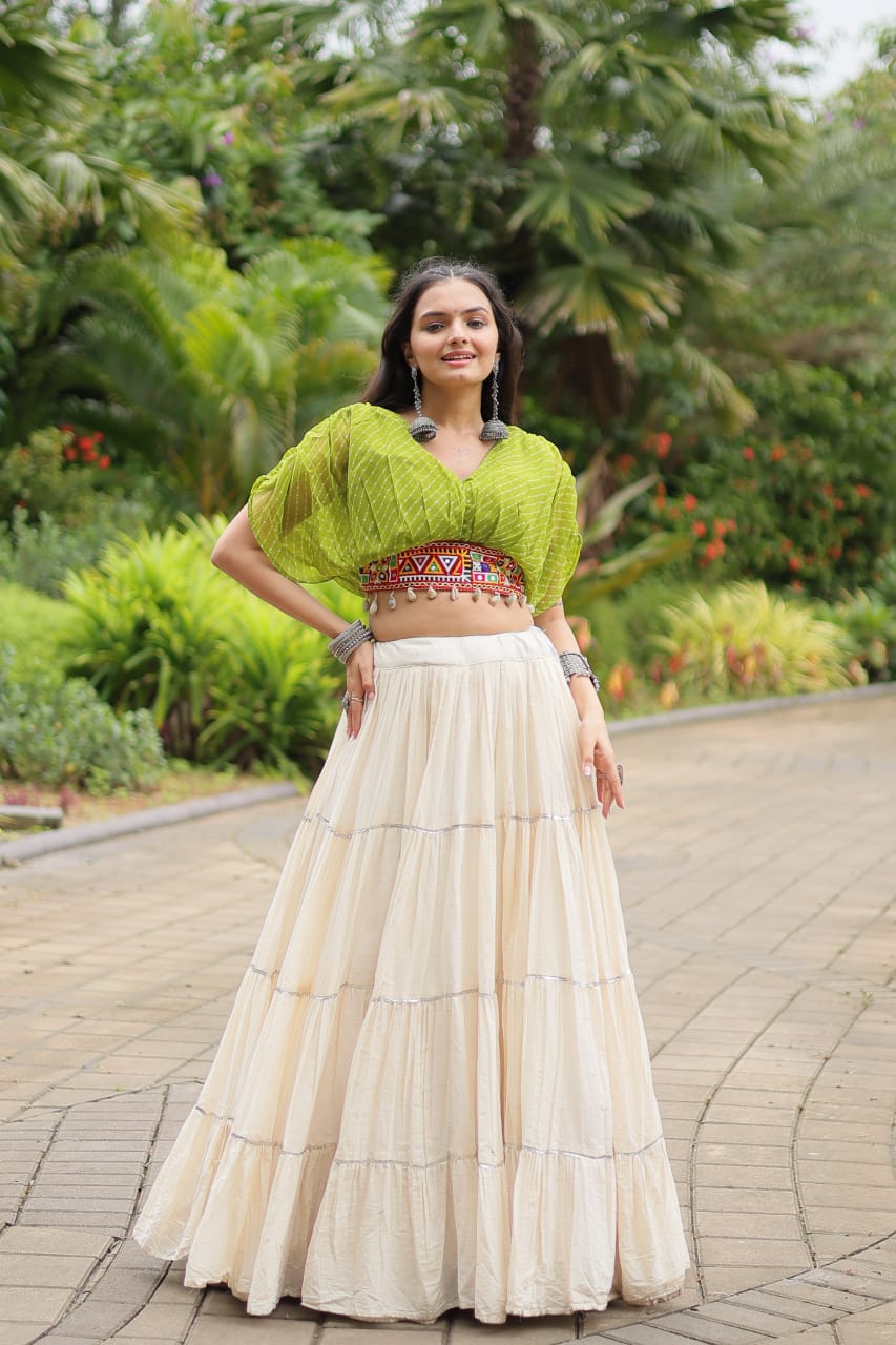 Green Navratri Twirl: Kora Cotton Garba Lehenga with 12-Meter Flair