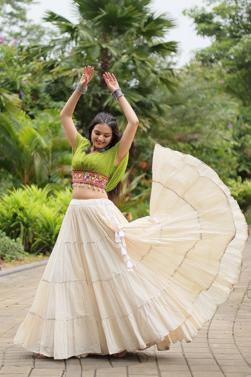 Green Navratri Twirl: Kora Cotton Garba Lehenga with 12-Meter Flair